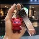 Брелок Мишка KAWS фиолетовый сувенир для ключей и сумки подарок другу стильный брелок (578885) - изображение 3