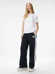 Спортивные штаны женские Converse CVW5B617-BLK L Черные (0198820117821) - изображение 3