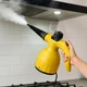Пароочисник для дому з насадками Steam Cleaner 1000Вт, ручний парогенератор 350 мл для прибирання та стерилізації, багатофункціональний відпарювач для чищення підлоги, вікон, плитки, сантехніки та одягу Жовтий, DF-A001 - зображення 1