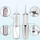 Портативний іригатор для ротової порожнини 230 мл Portable Oral Irrigator, з 2 насадками - зображення 4