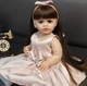 Реалистичная Кукла Реборн KEIUMI 55 см, силиконовая ваниловая девочка в бежевом платье и повязке. - изображение 2