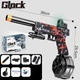 Игрушечный Glock пистолет на орбизах (гелевых шариках) 36 см аккумуляторный + 500 орбизов красный - изображение 1