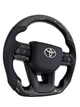 Анатомический руль с подушкой из кожи для Toyota Land Cruiser 200, Prado 150. С подогревом. Карбон. Логотип хром. - изображение 3