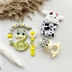 Подарочный набор для девочки с именной игрушкой грызунком Змея (хаки) на крестины, выписку, полгода - изображение 2