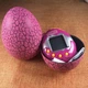 Интерактивная игрушка UFT электронный питомец Тамагочи в Яйце Динозавра Eggshell Game Pink (EggPink) (265933) - изображение 2