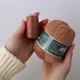 Пряжа из Норки, Карамель №834, 50 г/350 м, с дополнительной нитью для вязания - изображение 7