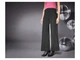 Брюки Клеш с люрексовой нитью для женщины Esmara LYCRA® 448471 L Черный - изображение 3