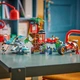 Конструктор LEGO Ninjago Автомобильная битва ниндзя у дома на дереве 642 детали (71857) - изображение 4