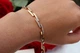 Браслет Xuping Jewelry Шахматка 19 см 6 мм золотистый - изображение 1