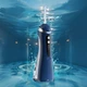 Ирригатор портативный для зубов и дёсен Dental Oral Irrigator 200 мл + 4 насадки Синий - изображение 2