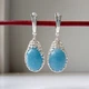 Серебряные серьги 925 пробы с аквамарином - изображение 4