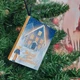 Новорічна іграшка на ялинку Книга "Коли сніг пахне мандаринками" - изображение 4