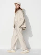 Брюки женские Uniqlo 930686658 S Бежевые (1159828325) - изображение 9