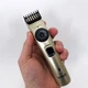 Машинка для стрижки волос беспроводная VGR V-031, триммер для бороды усов 2 насадки, окантовочная машинка - изображение 2