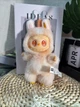 Мягкая игрушка сюрприз брелок на рюкзак Labubu Happiness желтого цвета для мальчика и девочки, Лабуба коллекционная Лабубу желтый 3 серии The Monsters 16 см, жёлтая - изображение 5