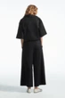 Кюлоти жіночі COS elasticated pleated culottes 1221419001 34 Чорний - зображення 4