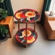 Стіл журнальний діаметром 40 см, висотою 52 см, прикрашений яскравим квітковим принтом - зображення 5
