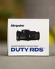Коллиматорный прицел Aimpoint Duty RDS с красной точкой 2 MOA на крепление Weaver/Picatinny - изображение 2
