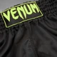 Шорты для тайского бокса и кикбоксинга Venum Classic (Muay Thai Shorts) черный/салатовый р. XL (Рост: 170–185 см | Вес: 70–85 кг) - изображение 3