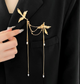 Брошка Fashion Jewerly две ласточки с цепочками женская бижутерия, золотистая (SVS) - изображение 1