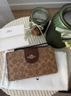 Гаманець книжка coach коричневий є відділення на телефон + подарункове пакування - изображение 3