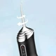 Ирригатор для полости рта A12 с аккумулятором три режима четыре насадки емкость 230 мл компактный легкий USB - изображение 12