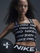 Спортивный топ для зала женский Nike W Np Bandage Tank FZ6988-010 L Черный (197599430315) - изображение 7