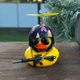 Аксессуар бешеная желтая уточка на торпеду в авто в шлеме с декоративным оружием - изображение 4