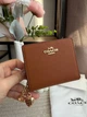 Гаманець Coach Snap Wallet In Signature Canvas коричневий натуральна шкіра + подарункове пакування - изображение 7