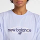 Женская сиреневая футболка New Balance Sport Relaxed Graphic 36 (S) (WT61Z7OQDYK) - изображение 4