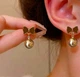Сережки деликатные подвески Бантики jewelry Коричневые - изображение 1