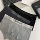 Набор трусов-боксеров Calvin Klein Luxury Redefined 3 шт XL светло-серый темно-серый чёрный - изображение 1