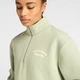 Женский зеленый реглан New Balance NB Linear Heritage Fleece Half Zip 34 (XS) (WT53511GAS) - изображение 4