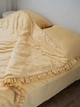Комплект постільної білизни Cozy з рюшами золотий Євро 200*220 см, простирадло 180*200*20 на резинці - изображение 1