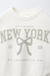 Світшот з блискучим містом Zara 5431/531 86см Бежевий (0543153180586) - изображение 3