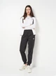 Спортивный костюм женский Puma Poly Baseball Suit Cl 69190502 M White (4069161386947) - изображение 1