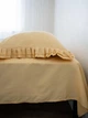Комплект постільної білизни Cozy з рюшами золотий Двоспальний 180*200 см, простирадло 200*240 без резинки - изображение 2