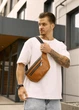 Большая мужская кожаная сумка на пояс бананка Sambag Tirso Max рыжая 38×17×6 см (81341121m) - изображение 1
