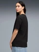 Футболка хлопковая длинная женская Puma Her Relaxed Graphic Tee 69188401 S Black (4069161879357) - изображение 2