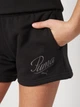 Детские шорты на резинке для девочки Puma Essentials Graphics 68586901 134-140 см Black (4067983504556) - изображение 4