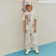 Футболка Molo Rodney Basket Mascots, колір бежевий, розмір 116 (1S26A212.9887) - зображення 2