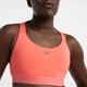 Женский розовый топ New Balance NB Essential Train Bra 34 (XS) (WB51035DTR) - изображение 4