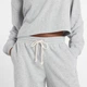 Женские серые брюки New Balance Coastal Fleece 42 (XL) (WP51503AGT) - изображение 5