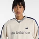 Жіночий бежевий реглан New Balance Satin Woven Pullover 38 (M) (WT61145ILIN) - зображення 5