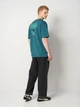 Футболка хлопковая длинная мужская Puma Essentials Graphics 69202341 M Emerald Ice с принтом (4069161732546) - изображение 3