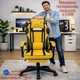 Геймерське крісло до 130 кг з масажною подушкою, підніжкою ThroneX жовте з чорним PVC 001 - изображение 1