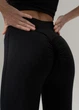 Базовые женские лосины клеш от колена с Push Up эффектом повседневные однотонные для тренировок L Черный (17023056) - изображение 4