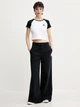 Футболка хлопковая женская Converse Chuck Patch Ss Top Trail Mixed 10027396-001 XS Black (194435389097) - изображение 3