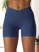 Спортивные женские короткие шорты Soft SQ с перекрестным поясом и эффектом push up для фитнеса, йоги, танцев Бесшовные с утяжкой Однотонные M Темно-синий (SQSH02M) - изображение 4