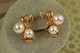 Серьги Xuping Jewelry Бант с двумя крупными жемчужинами 2,1 см золотистые - изображение 2